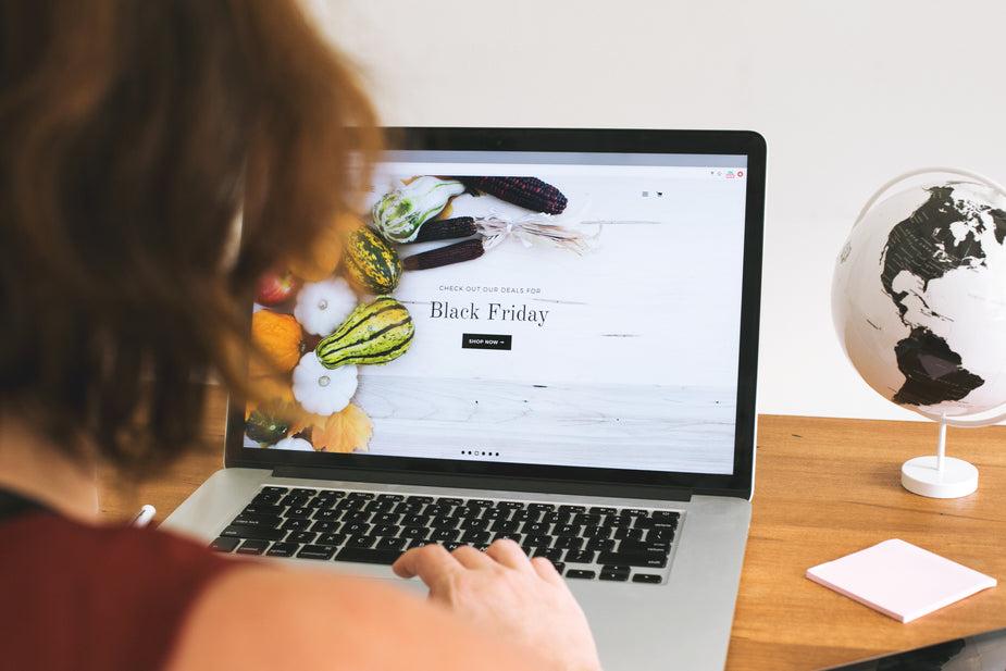 image of web designer working on laptop